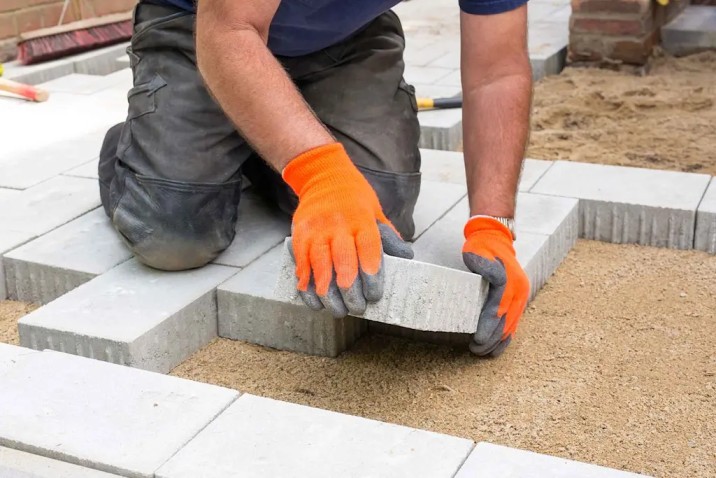 Local patio paving company in Swansea installing high-quality garden patio