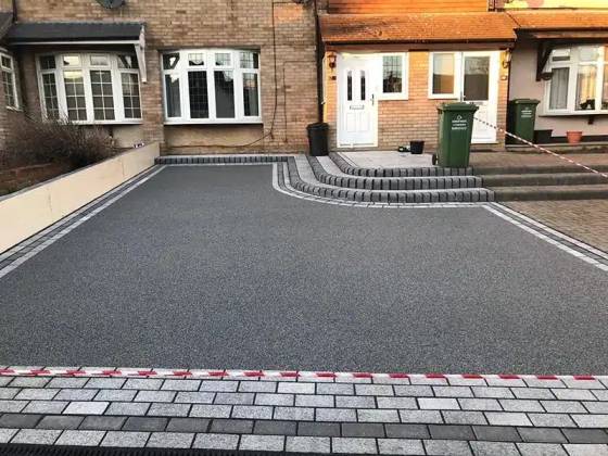Resin bound driveway installation near Swansea with modern finish