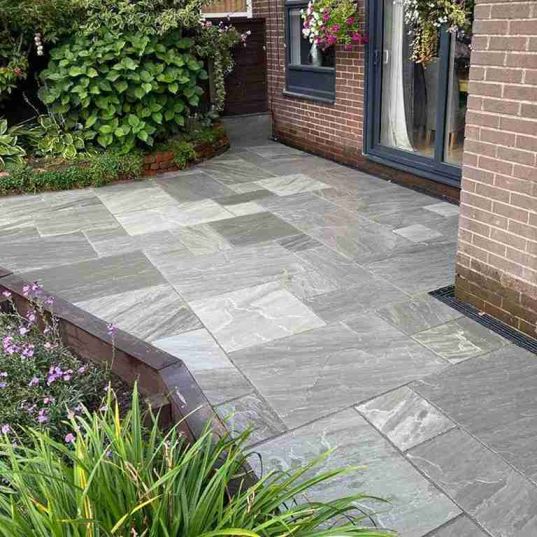 Garden patio installation by contractors in Carmarthen