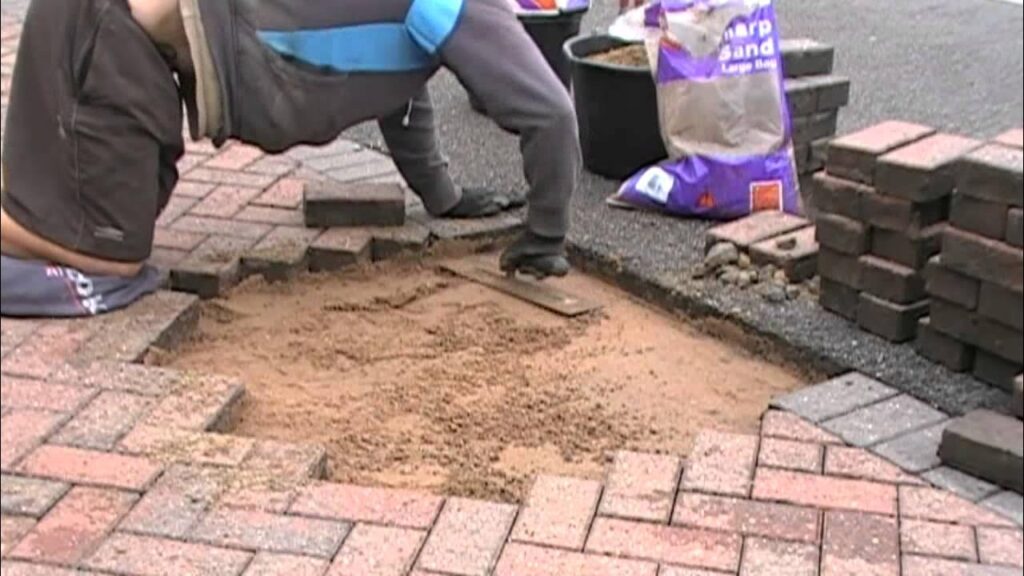 Block paving repair in progress in Swansea driveway